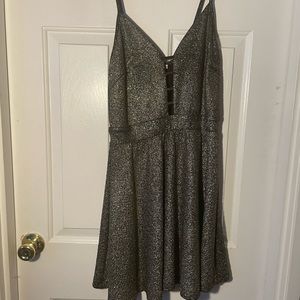 Black party dress with gold sparkles